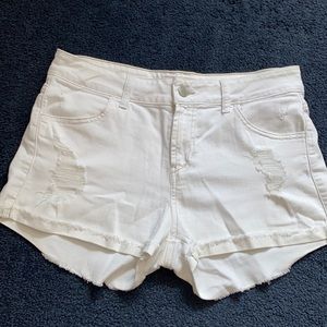 White, ripped shorts